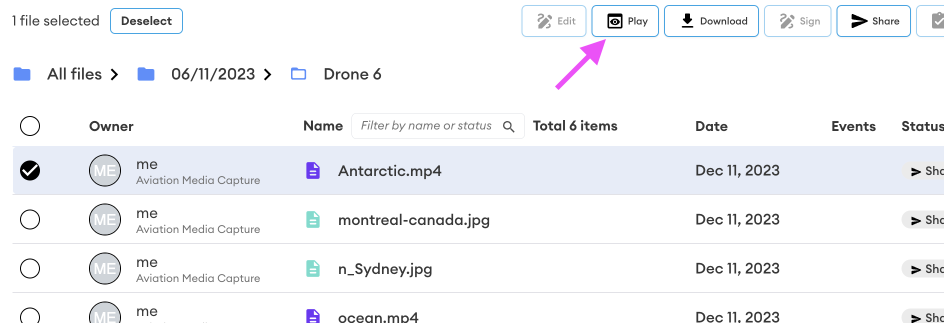 Interface showing one file selected in the Drone 6 folder, with the Play button highlighted by a pink arrow among the action buttons.