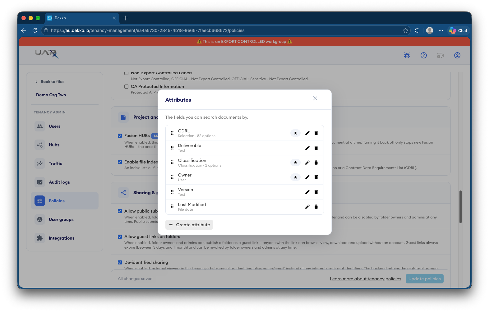 Attributes dialog on the Policies page listing CDRL, Deliverable, Classification, Owner, Version and Last Modified, with star icons marking required attributes and a Create attribute button.