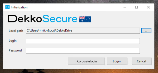 Initialization window for DekkoDrive showing the Local path field set to a C:\\Users folder ending in DekkoDrive, with Login, Password, and Corporate login buttons.