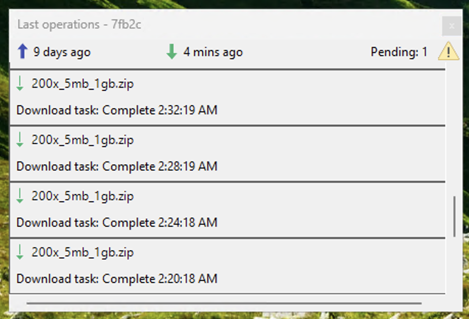 Last operations window showing the yellow warning icon beside "Pending: 1", with recent completed download tasks listed.