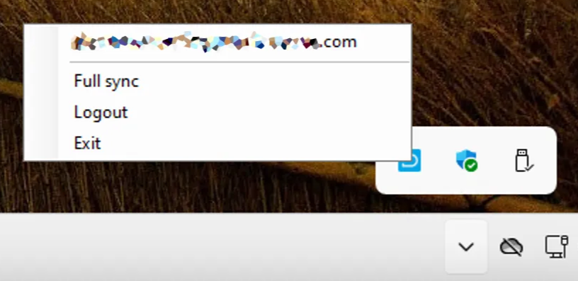 DekkoDrive tray menu showing the account email above the options Full sync, Logout and