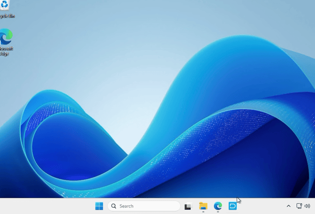 Windows 11 desktop showing the taskbar with the Search box, Edge icon and file explorer, plus the Recycle Bin and Edge desktop icons.